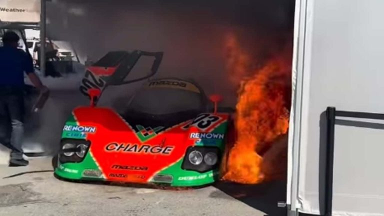 Screenshot of 1989 Mazda 767B No. 203 caught fire in the Laguna Seca paddock